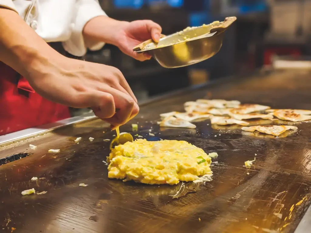 Cocinando okonomiyaki